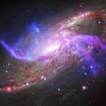 A spiral galaxy, also known as M106, about 23 million light years from Earth.